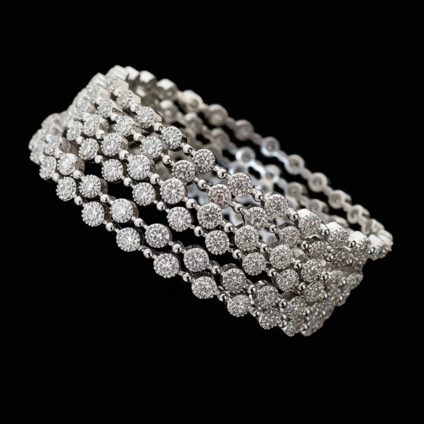 Silver bracelet on a black stand with 'SAHELI' branding in the background