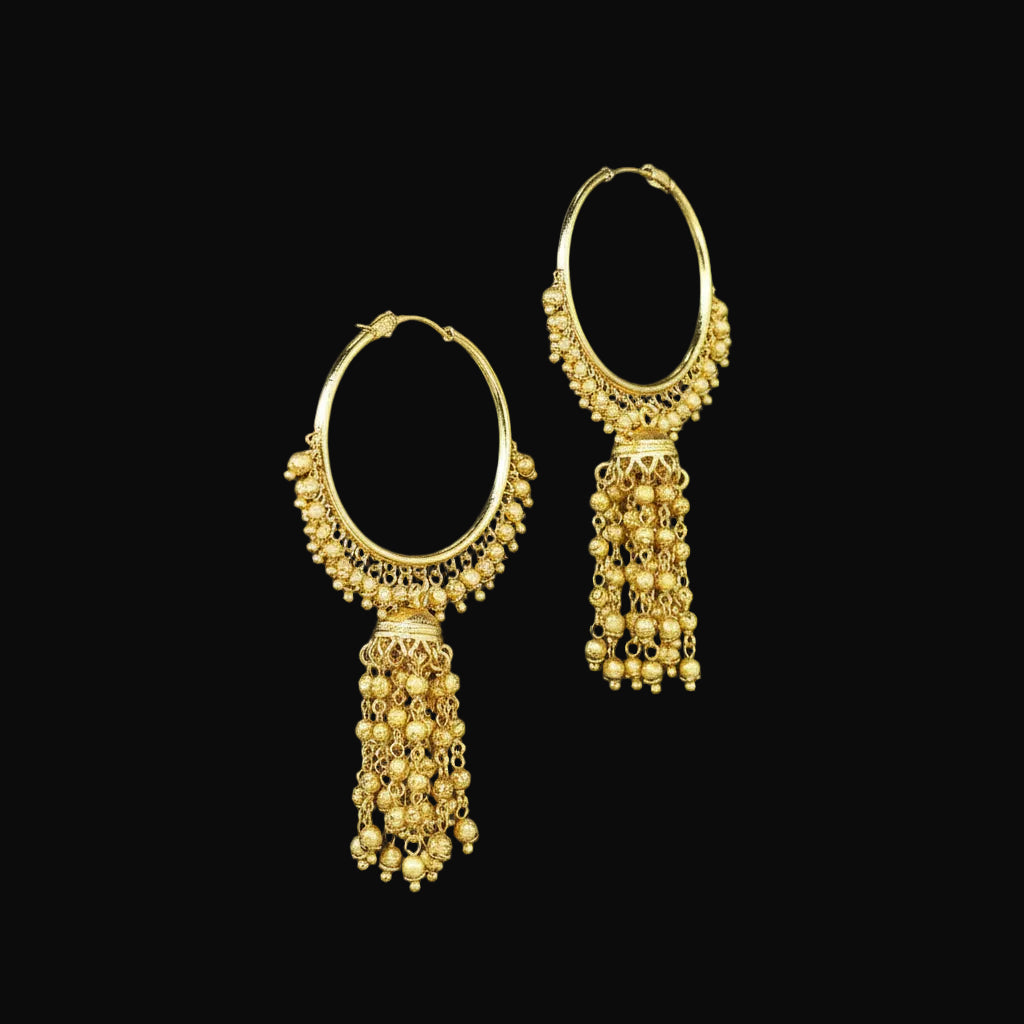 Gold hoop earrings with dangling beads on a black background, branded 'Saheli'.