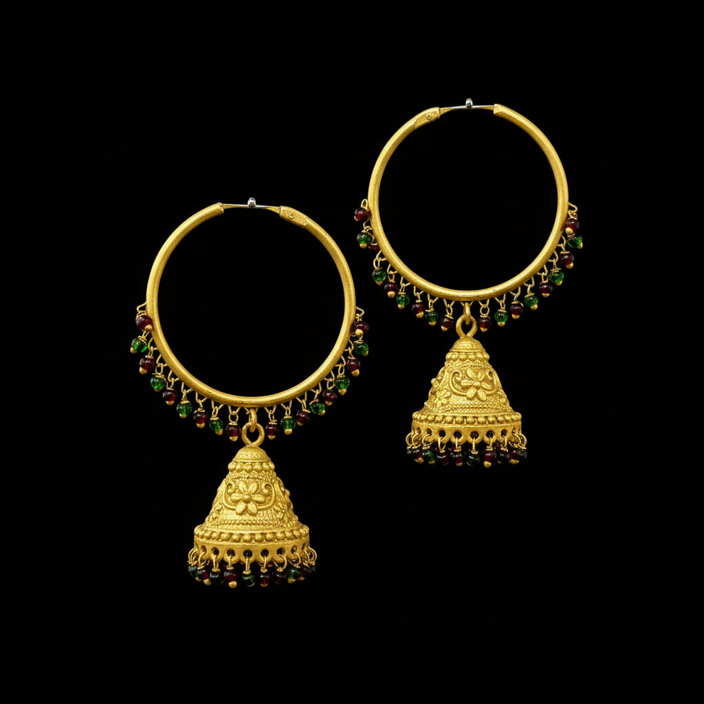 Gold hoop earrings with jhumkas on a gray background, featuring the brand 'Saheli'.