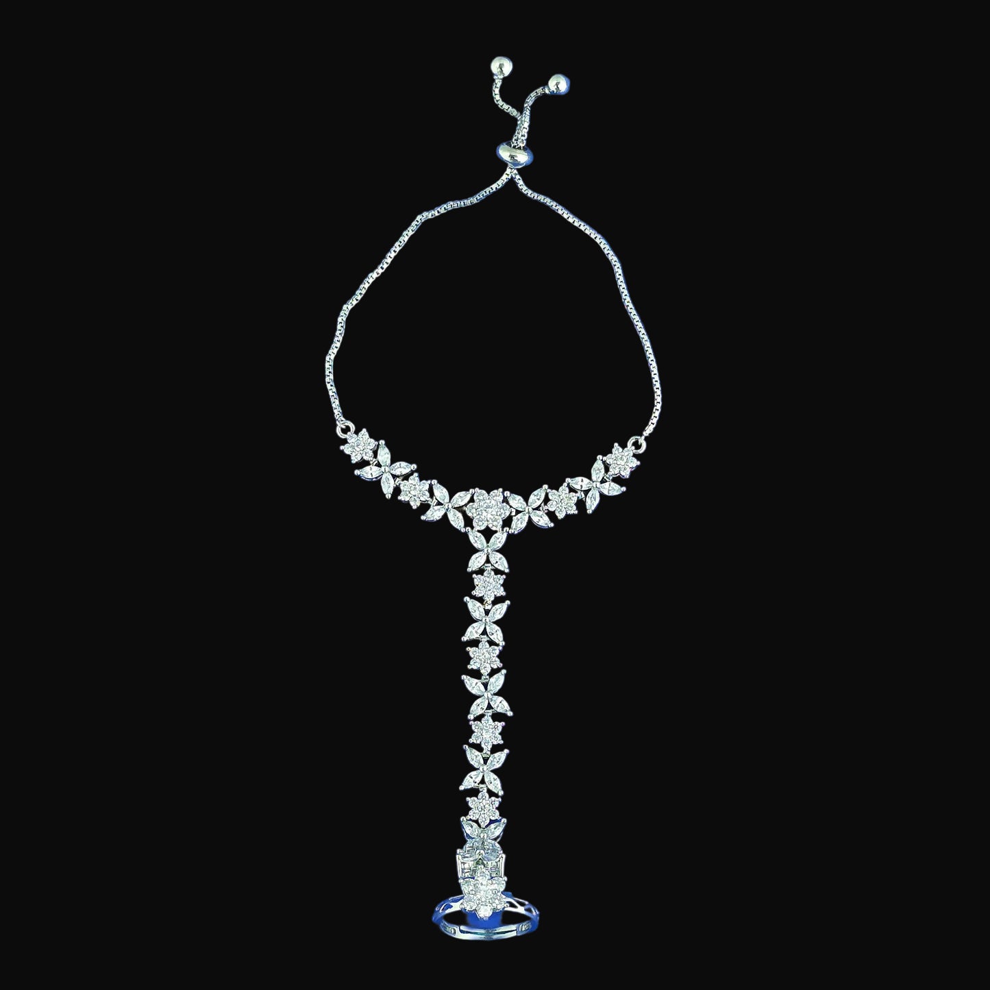 Silver floral necklace on a blue background