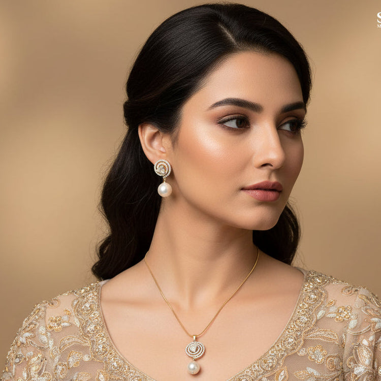 Jewelry set with necklace and earrings on a black background, branded 'Saheli'.