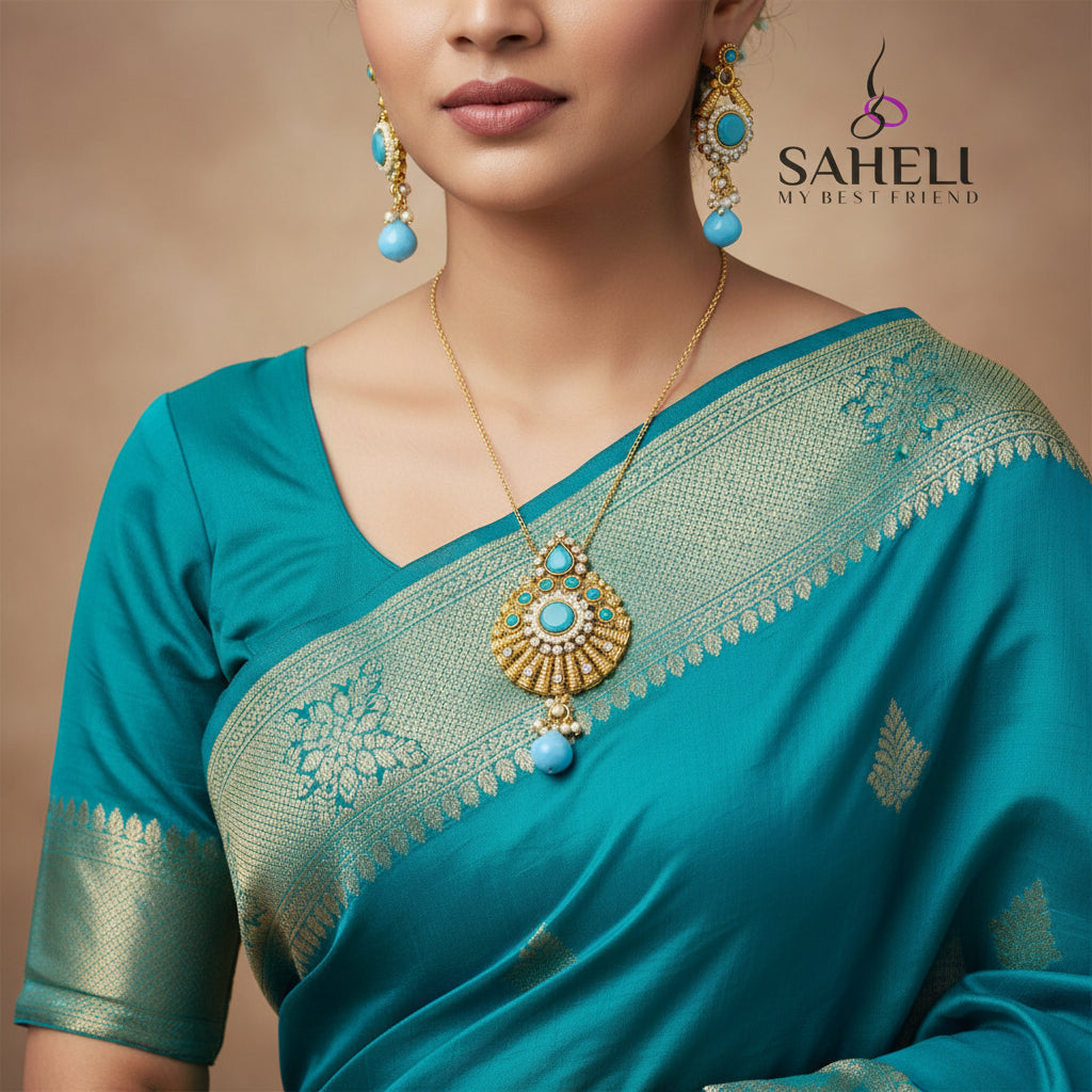 Gold and blue earrings on a dark background with 'SAHELI' branding.