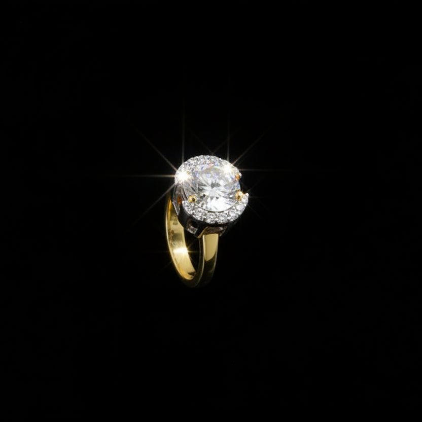 Diamond ring on a dark stone surface with 'Saheli' branding.