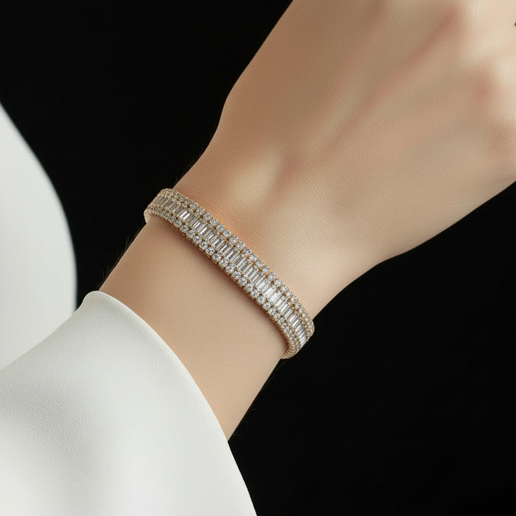 Gold bracelet on a dark gray background