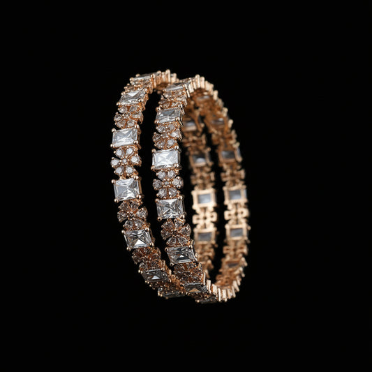 Gold and silver bracelet on a dark gray background