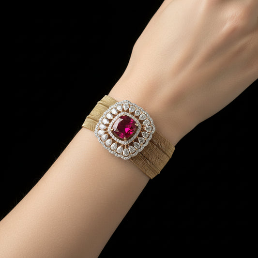 Jewelry box with a decorative headband featuring a red gemstone and gold band on a gray cushion, branded 'Saheli'.