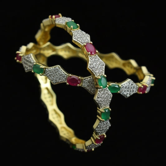 Gold bracelet with gemstones on a black mannequin against a dark background, featuring the brand 'Saheli'.