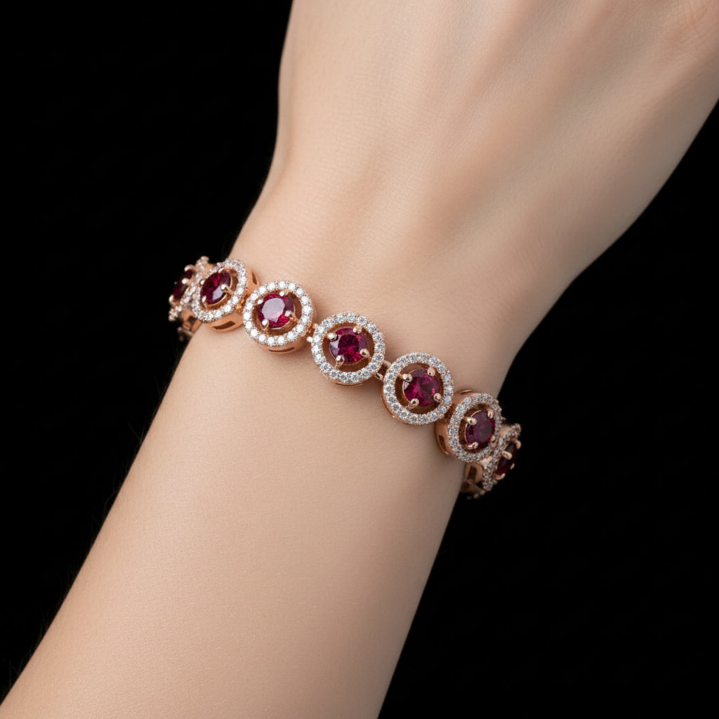 Jewelry bracelet with pink gemstones on a dark surface, branded 'Saheli'.