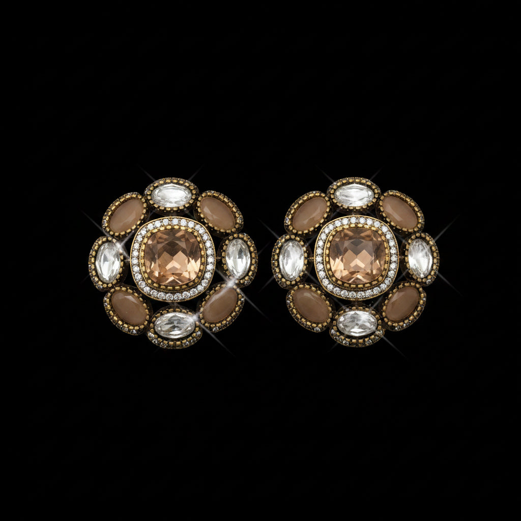 Decorative earrings with brown and clear stones on a light gray background, featuring SJNX-CODE-R-135.