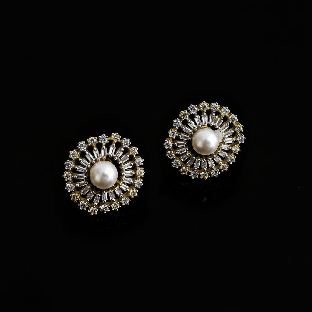 Pair of gold and pearl earrings on a dark background with 'Saheli' branding.