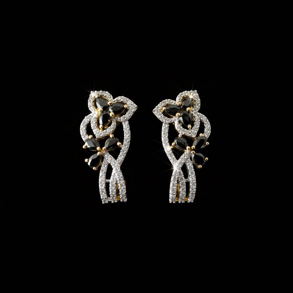 Pair of diamond earrings on a dark gray stand with 'Saheli' branding.