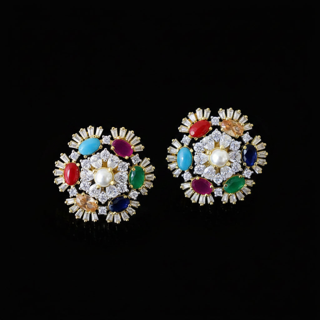 Pair of colorful gemstone earrings on a dark background