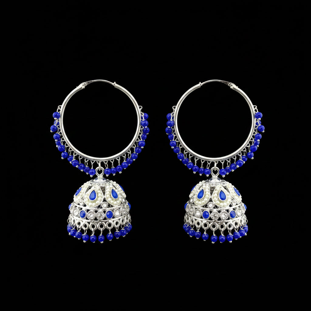 Pair of silver and blue beaded earrings on a gray stand with HP logo in the background.