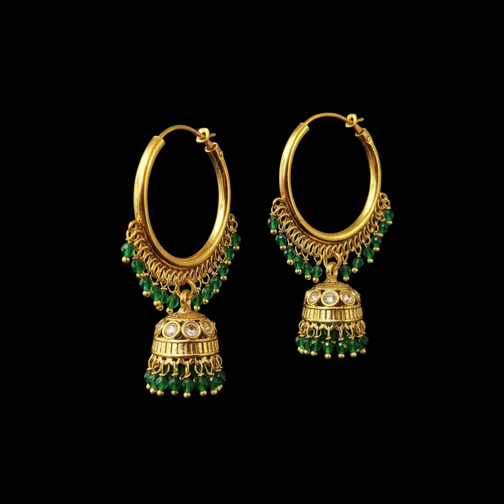 Gold hoop earrings with green beads on a gray background, featuring the brand 'SAHELI'.