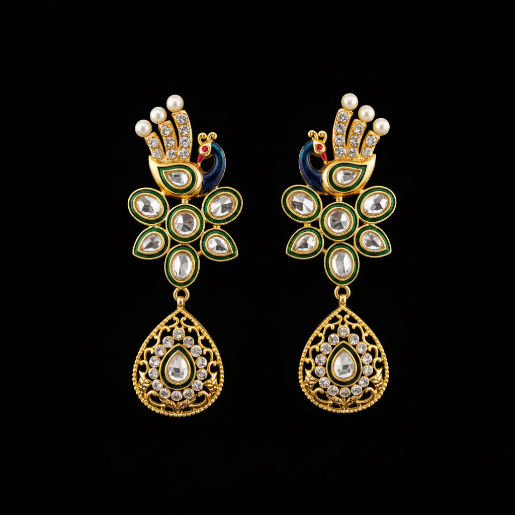 A pair of gold-plated Indian Kundan earrings with green enamel, white faux pearls, and clear crystals, displayed on a black Y-shaped stand against a gray background with the brand logo 'SAHeli My Best Friend' in the center.