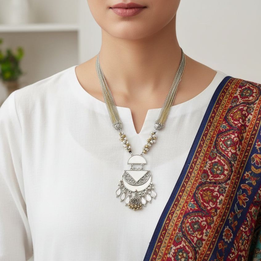 Decorative necklace with a pendant on a gray background
