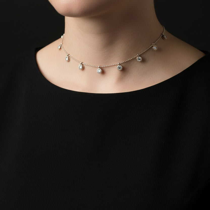 Delicate necklace with small diamonds on a dark background