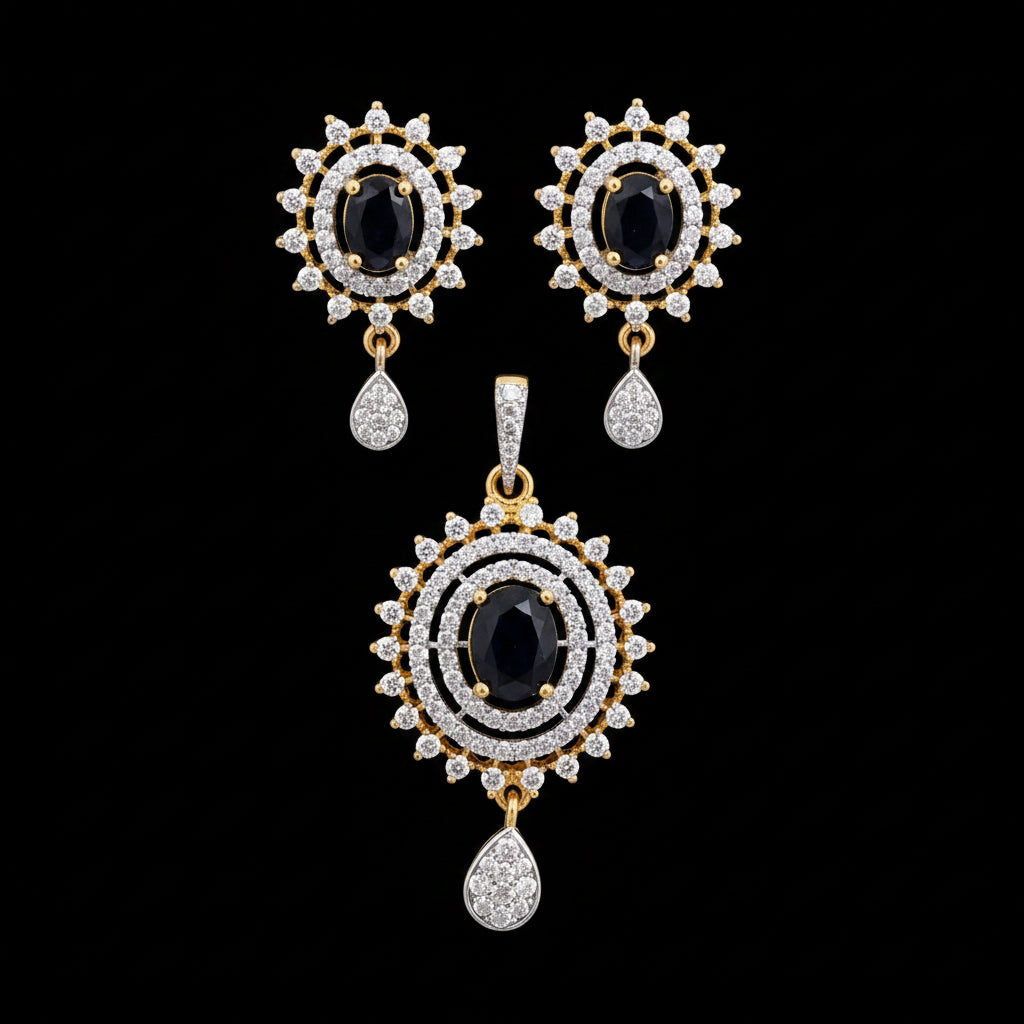 Ornate earrings with black gemstones and gold accents on a gray surface, branded 'SAHELI'.