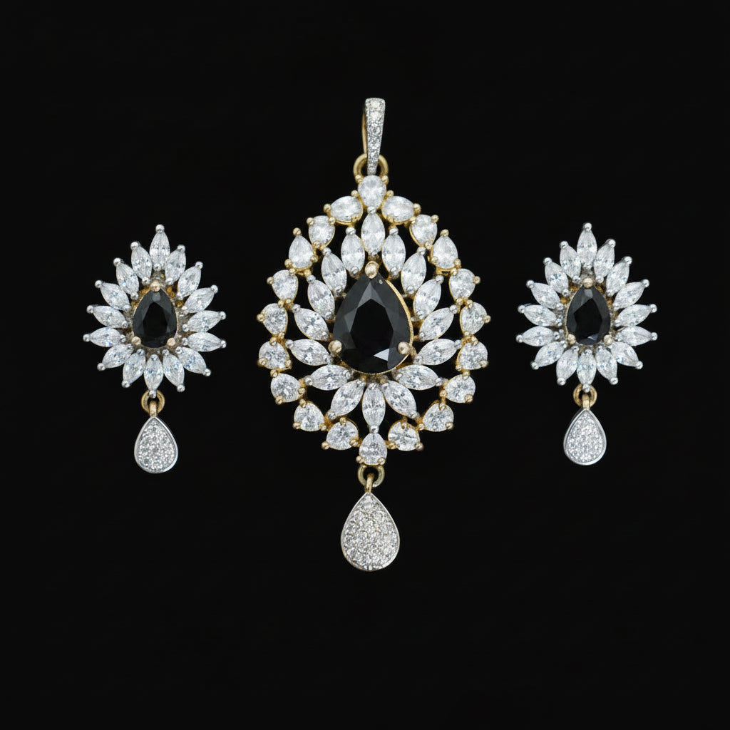 Jewelry set with teardrop-shaped diamonds on a dark background, featuring the brand 'Saheli'.