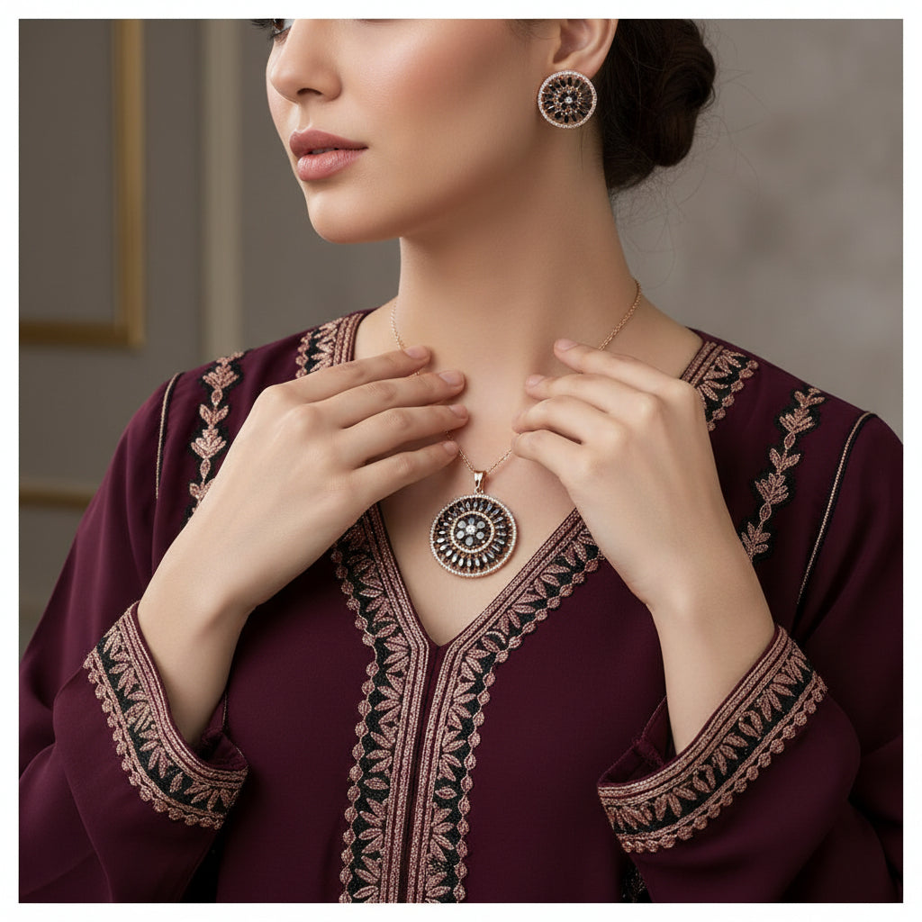 Jewelry set with pendant and earrings on a dark background