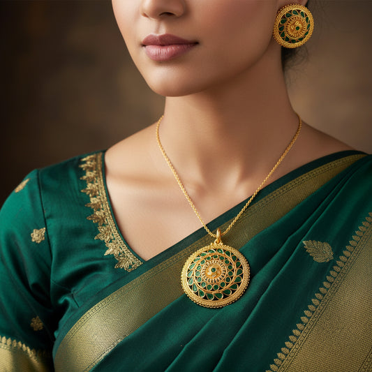 Gold and green jewelry set with 'Saheli' branding on a black background