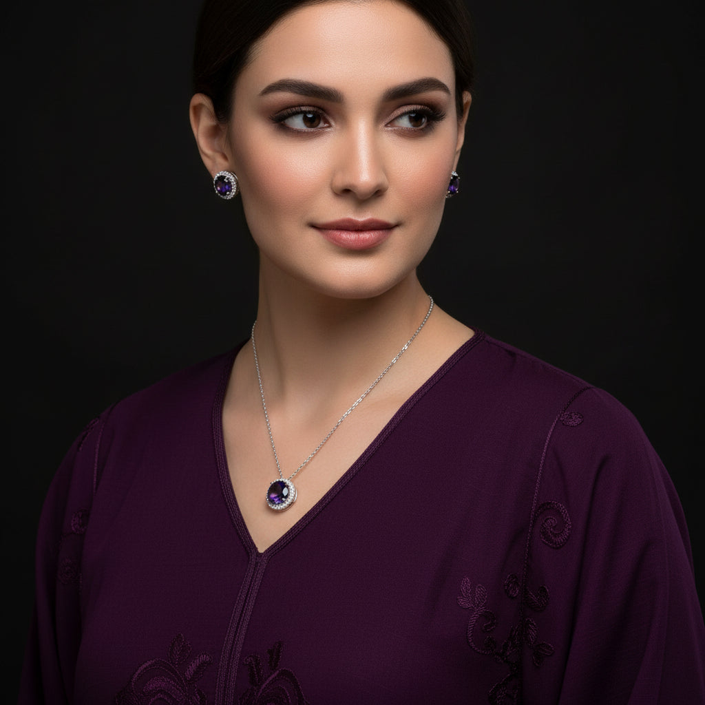 Jewelry set with necklace and earrings on a black background, featuring the brand 'Saheli'.