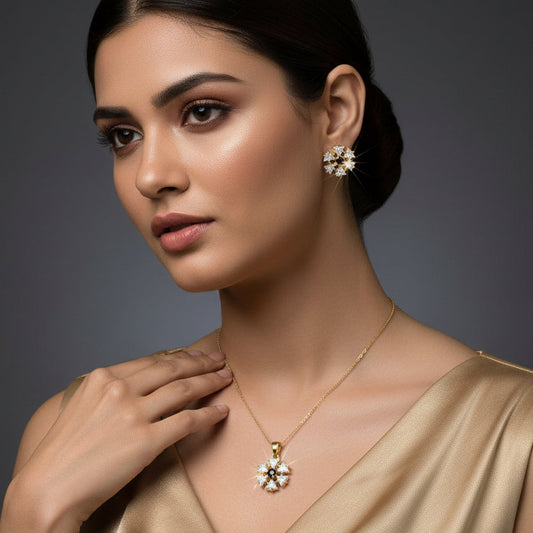 Gold and diamond earrings with 'Saheli' branding on a dark background