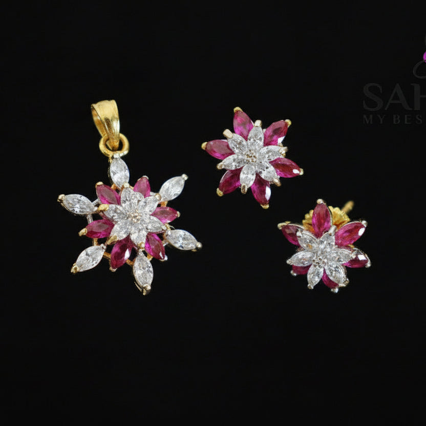 Diamond earrings with pink gemstones on a black stand, branded 'Saheli'.