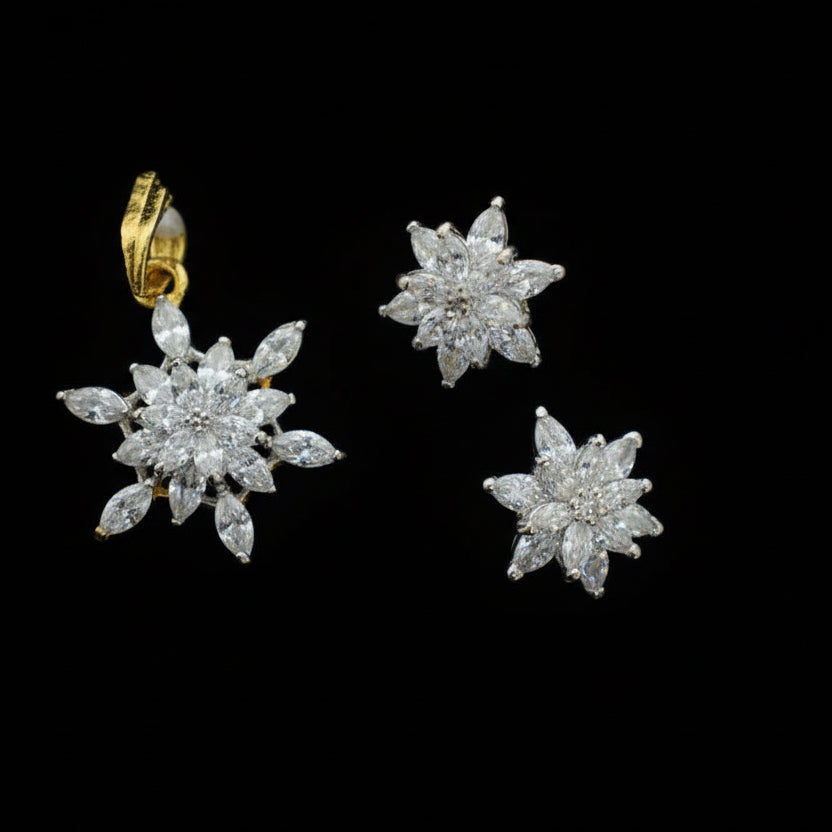 Diamond earrings on a black stand with 'SAHELI' branding.