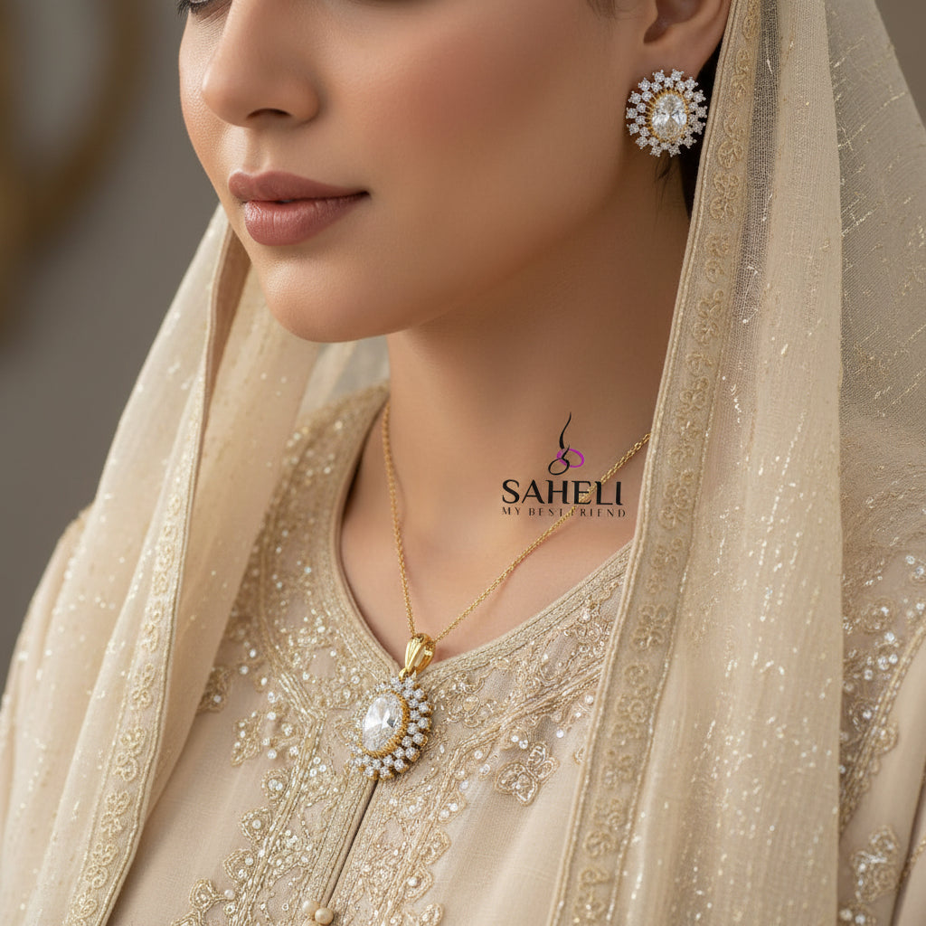 Gold and diamond earrings on a dark background with 'SAHELI' branding.