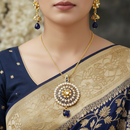 Gold and blue earrings on a gray background with 'SAHELL' branding.