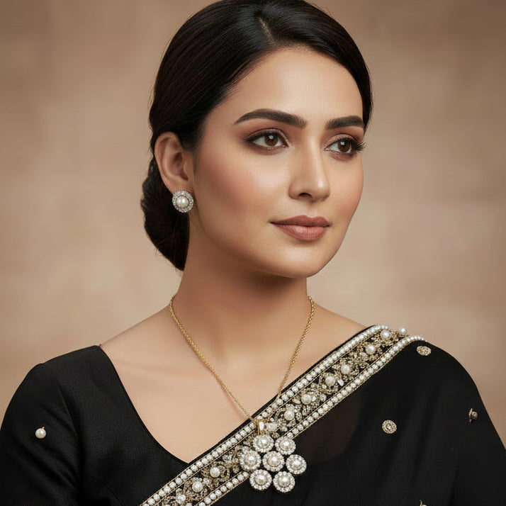 Pair of pearl and diamond earrings on a dark background with 'SAHELI' branding.