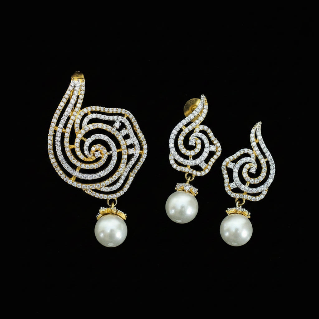 Ornate earrings with pearls on a dark background, featuring the brand 'Saheli'.