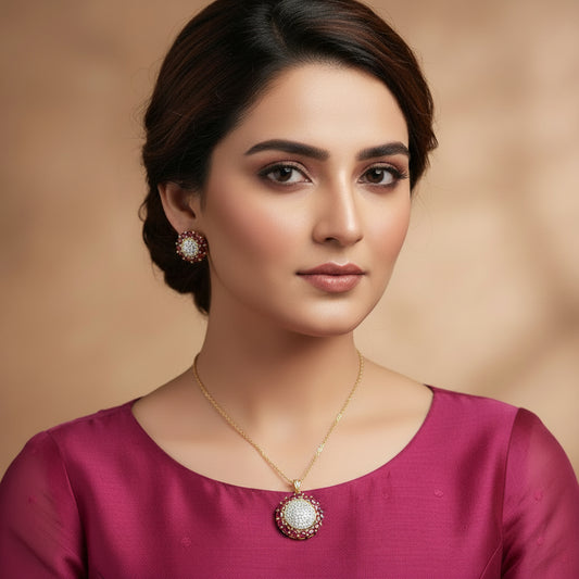 Jewelry set with pink gemstones and gold accents on a gray background, featuring the brand 'Saheli'.