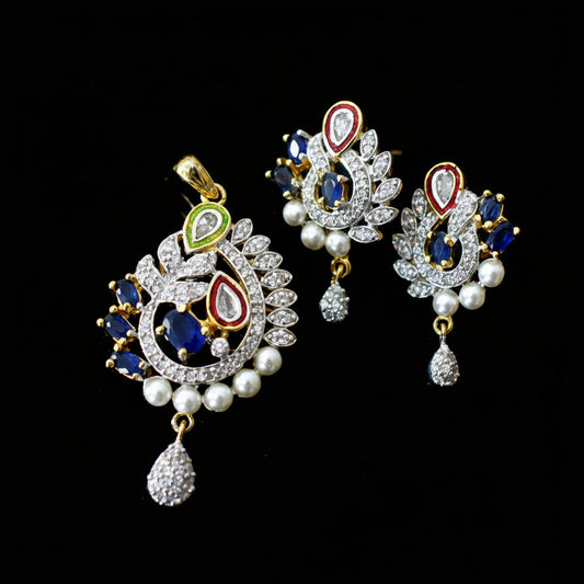 Ornate earrings with pearls and gemstones on a dark background, branded 'SAHELI'.