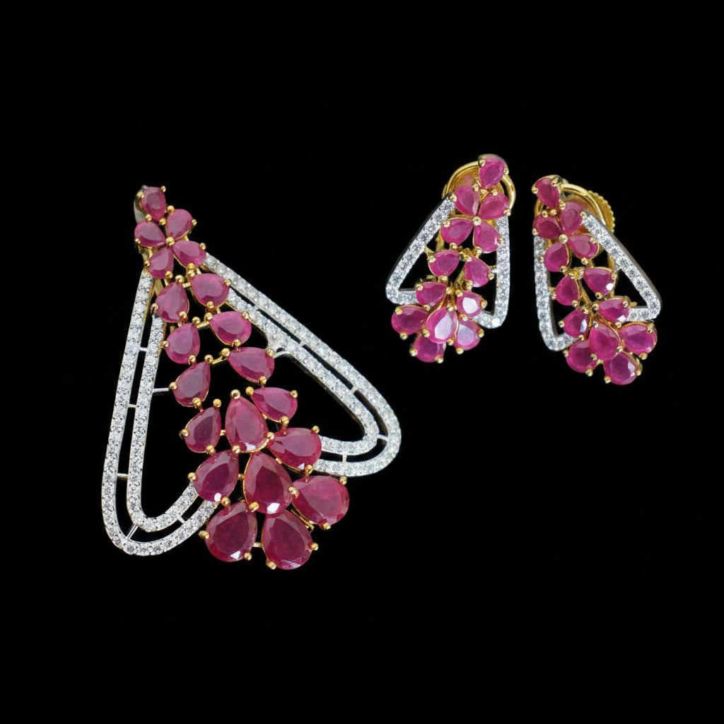 Jewelry set with pink gemstones on a dark background, featuring the brand 'Saheli'.