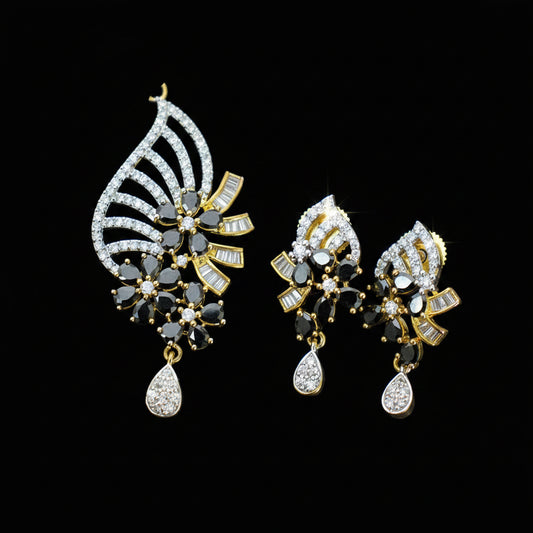 Ornate earrings with gemstones on a dark background, featuring the brand 'Saheli'.