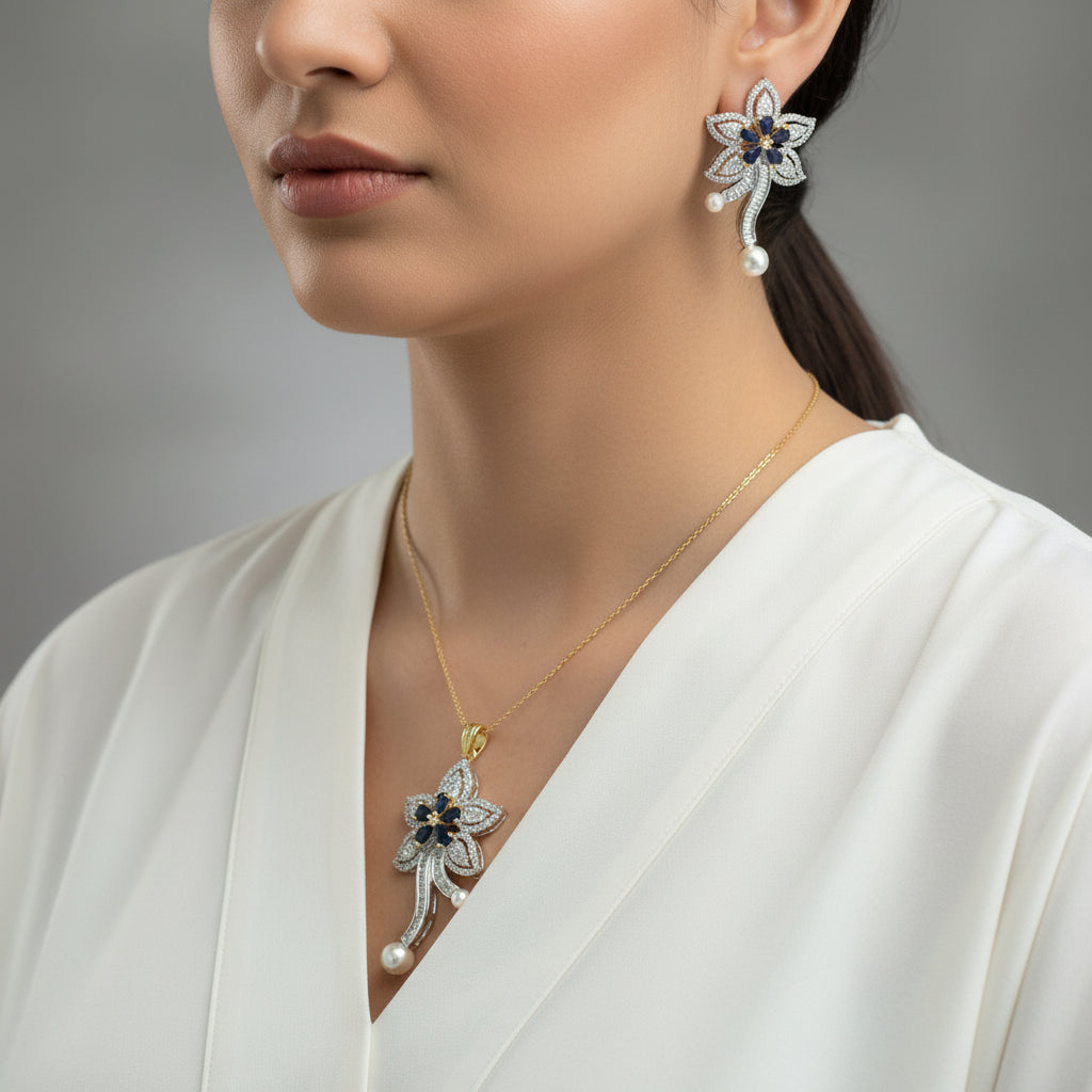 Butterfly-shaped jewelry set with blue stones and pearls on a dark background, branded 'Saheli'.