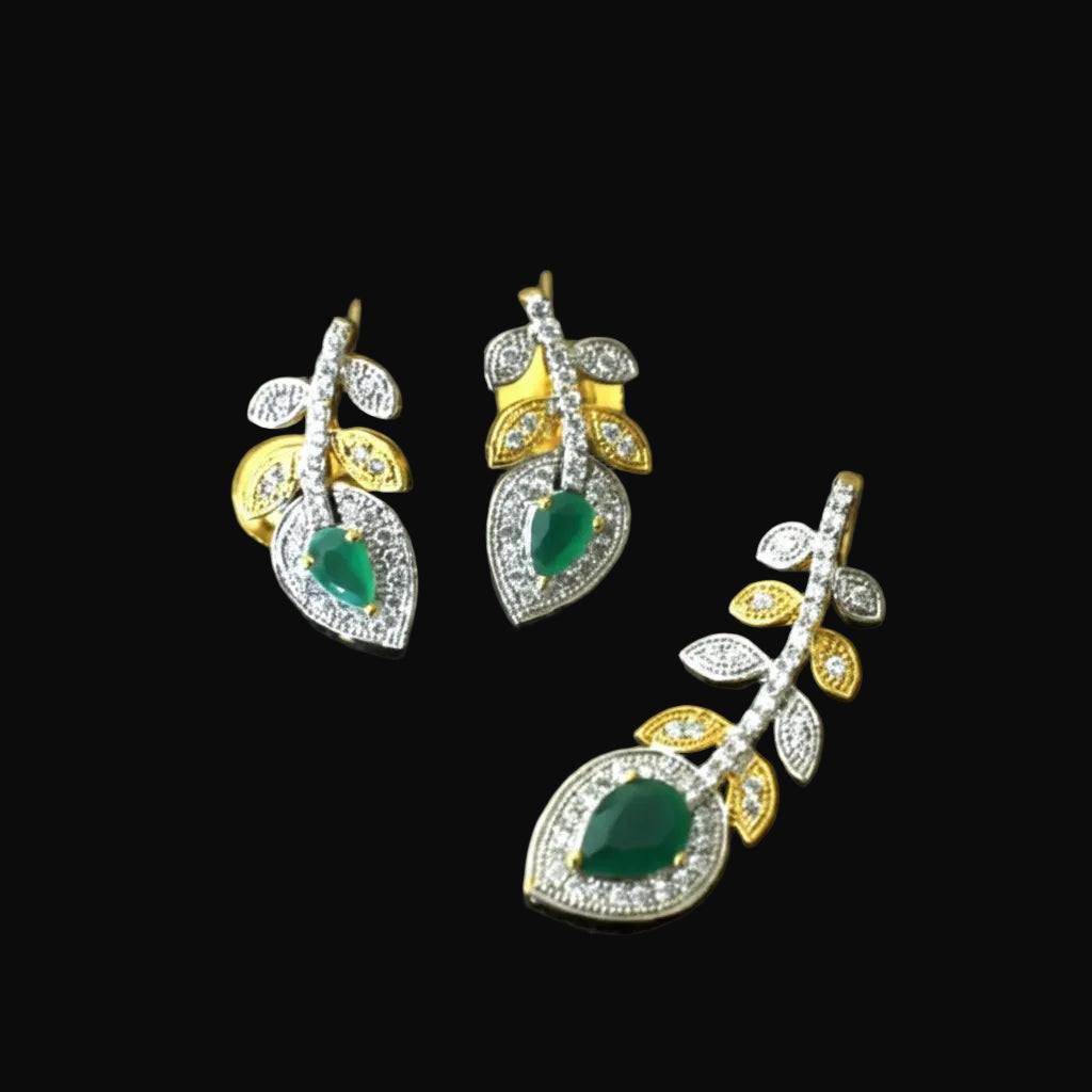 Jewelry set with green gemstones and gold accents on a dark background, featuring the brand 'Saheli'.