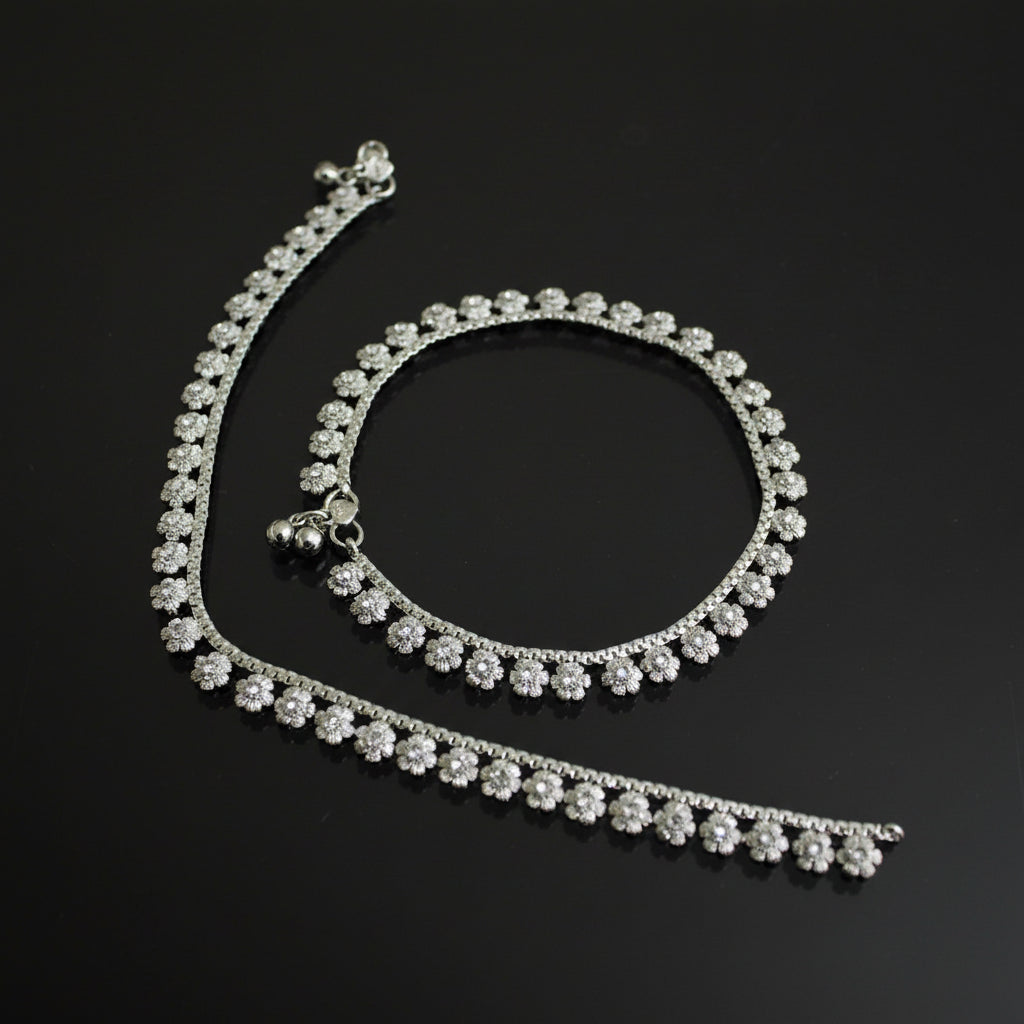 Silver necklace with a clasp on a dark background
