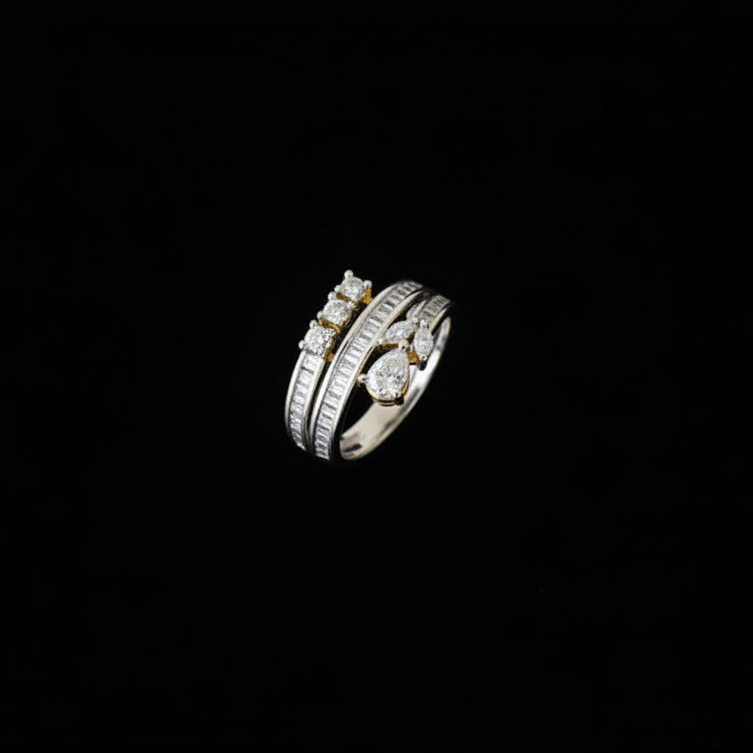 Gold ring with diamonds on a black mannequin hand, branded 'SAHELI'.