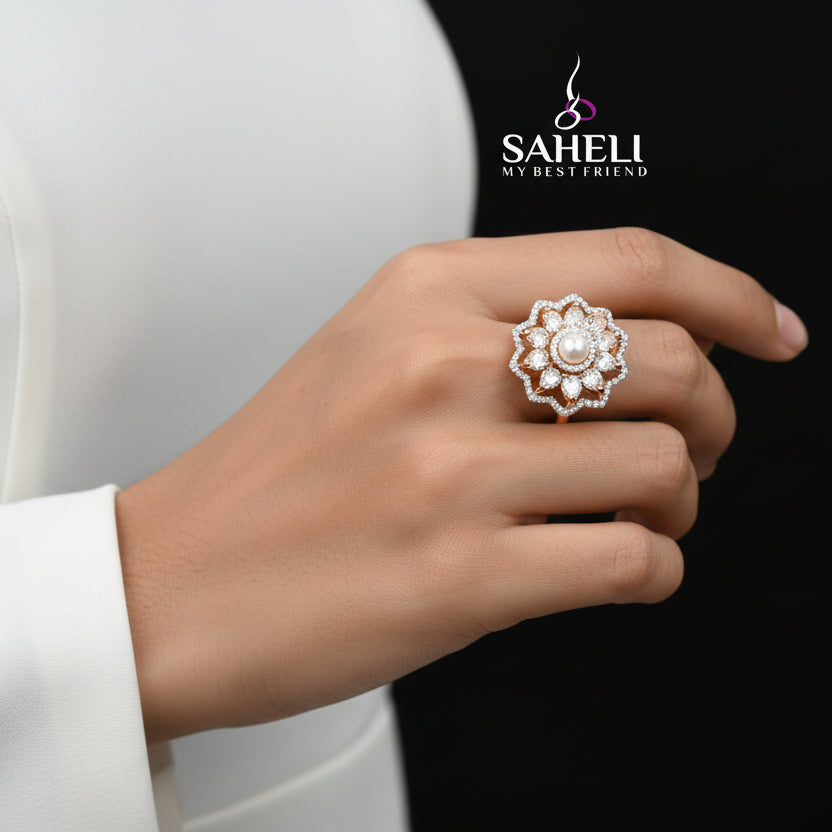 Jewelry ring with 'Saheli' brand logo on a dark background