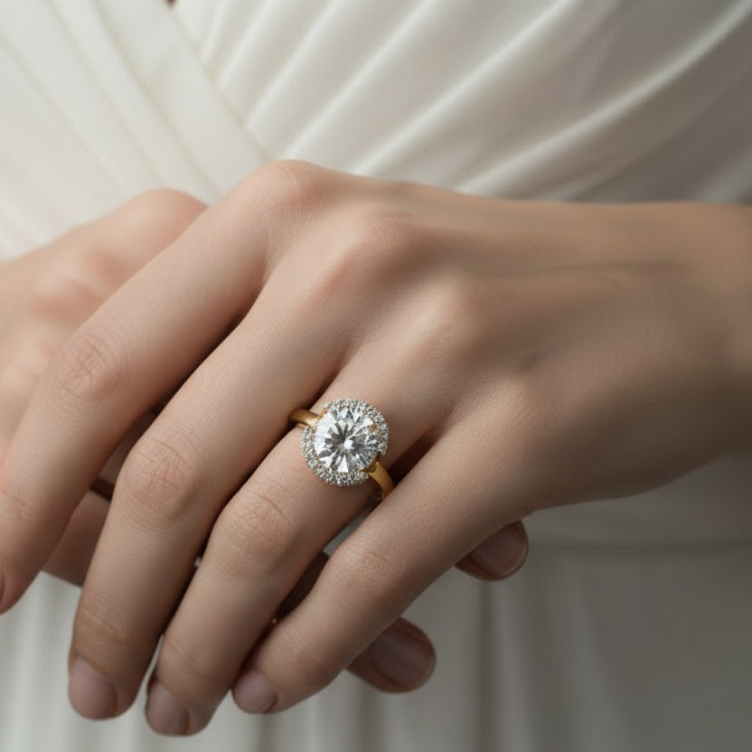 Diamond ring on a dark stone surface with 'Saheli' branding.