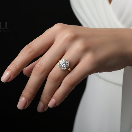 Diamond ring on a dark stone surface with 'Saheli' branding.