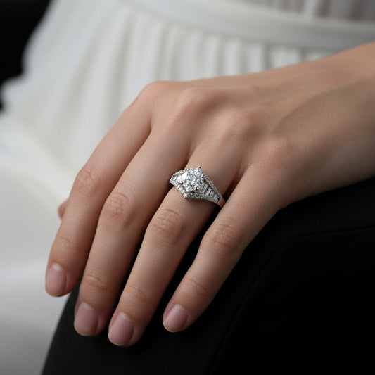 Diamond ring on a black mannequin hand with a dark background