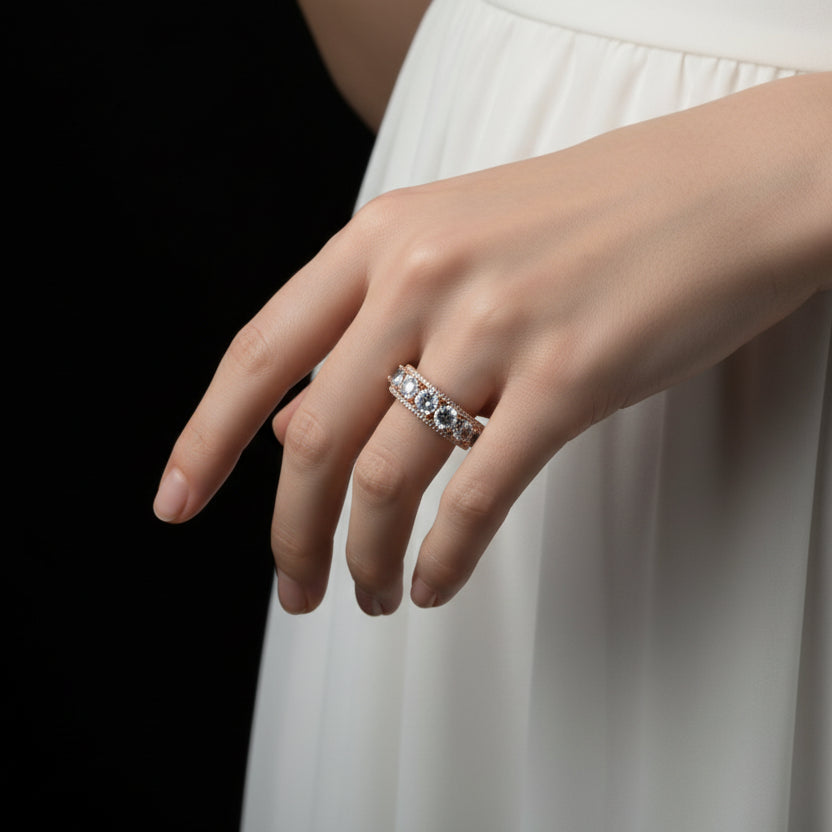 Elegant ring with multiple gemstones on a dark background