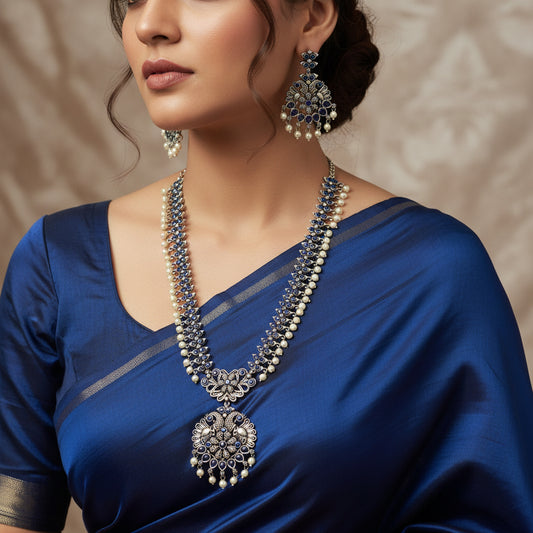 Jewelry set with necklace and earrings on a dark background