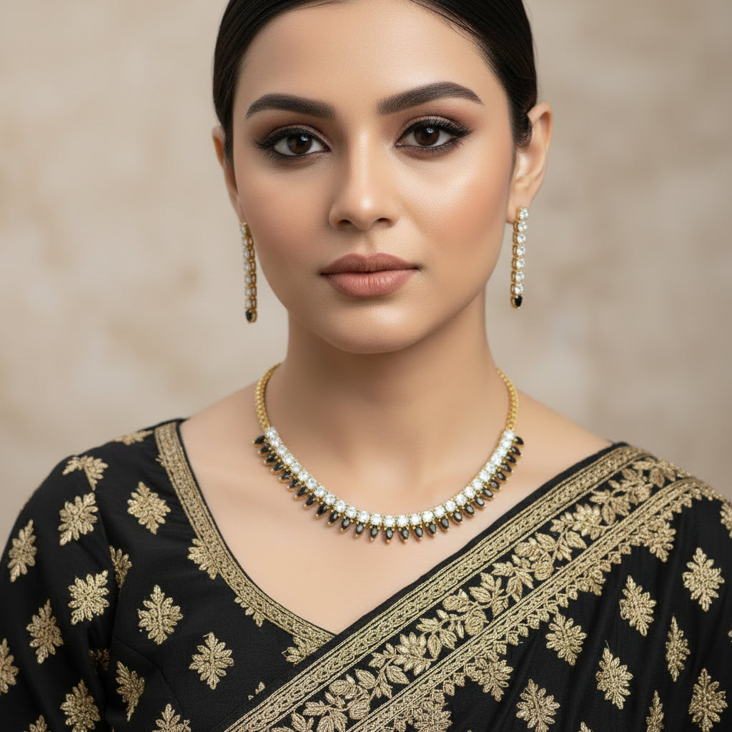 Gold and diamond necklace on a black background with 'SAHELI' branding.