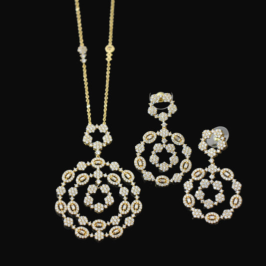 Gold and diamond jewelry set on a dark background