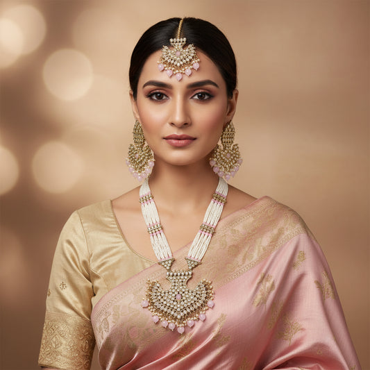 Ornate necklace with matching earrings on a dark background